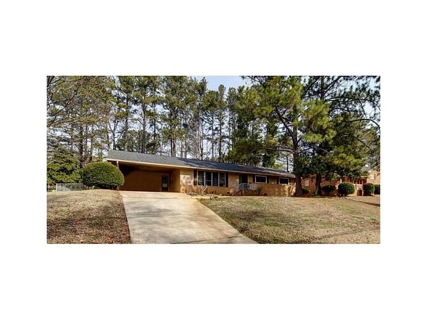 Exterior Front. Four Side Brick Ranch