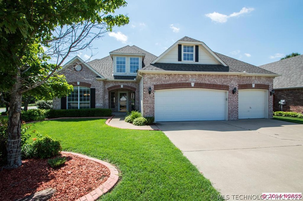 Beautiful brick home sits on a corner lot and back