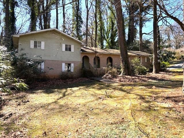 Split level home, brick and frame.