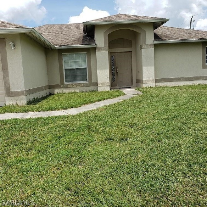 122 Ocean Park Dr, Lehigh Acres, FL 33972 - photo 1