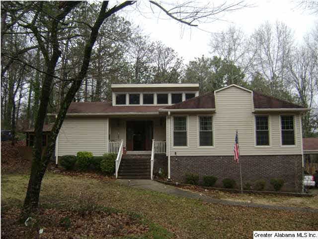 low maintenance vinyl siding with brick foundation