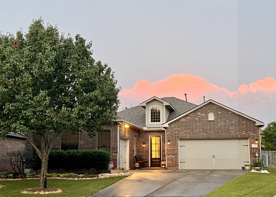 CLASSIC HOME ACCENTED WITH GLASS FRONT DOOR LAVISH
