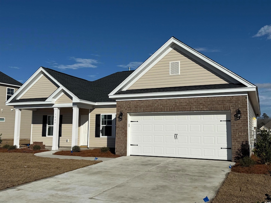Back of house with a patio area