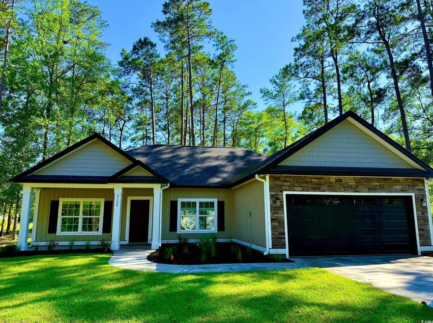 Craftsman inspired home with an attached garage, driveway, stone siding, a front lawn, and board and batten siding