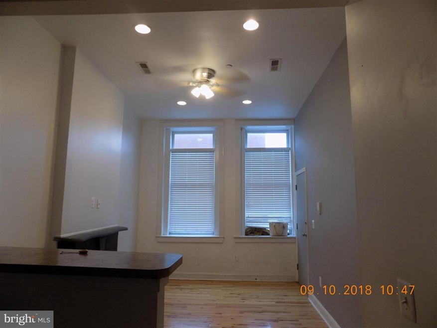 329 N Eutaw St unit 2, Baltimore, MD 21201 - photo 1