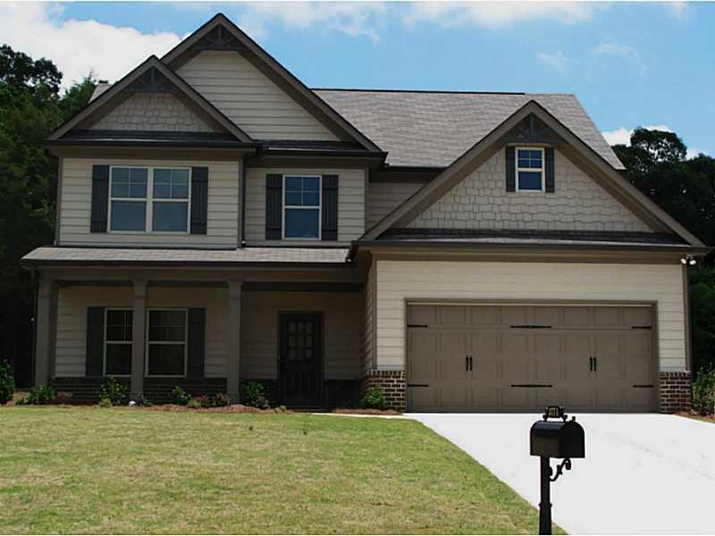 Exterior Front. Brick Accent