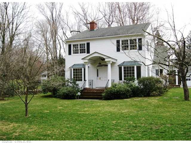 Exterior Front. Stately colonial surrounded by his