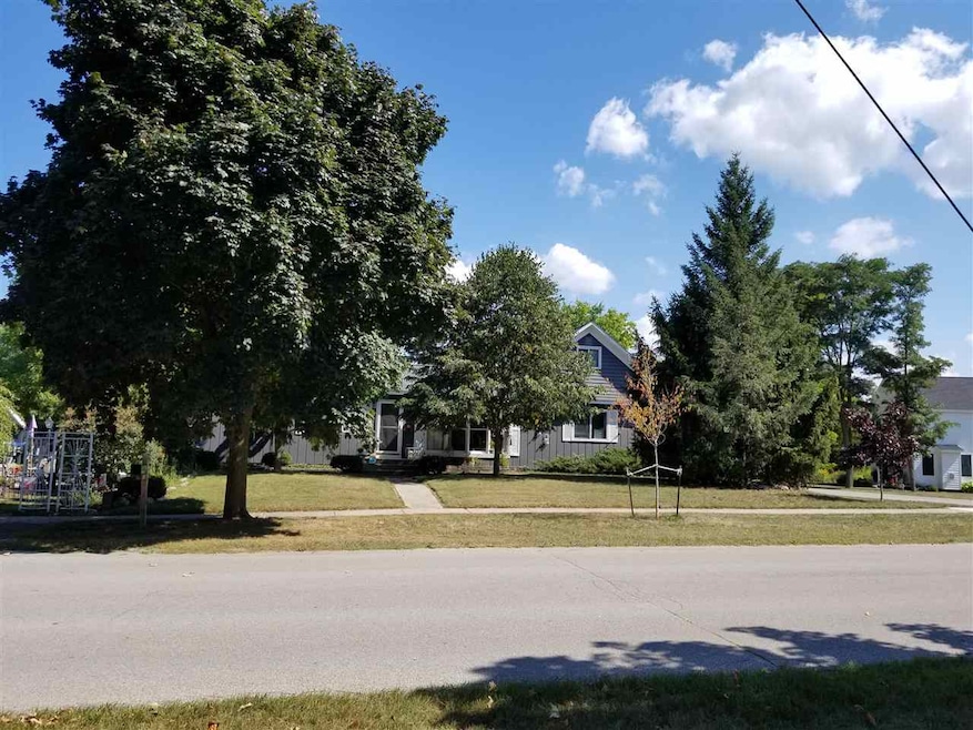 321 Cedar St, Elk Rapids, MI 49629 - photo 1