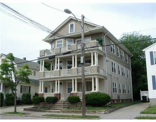 Exterior Front. This large 3 family has new siding