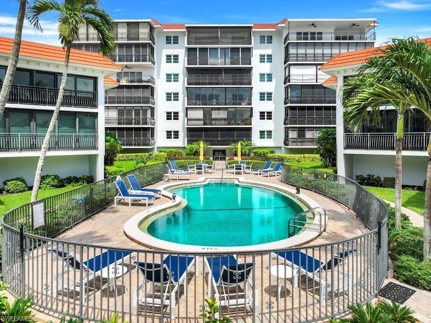 Community pool featuring a patio