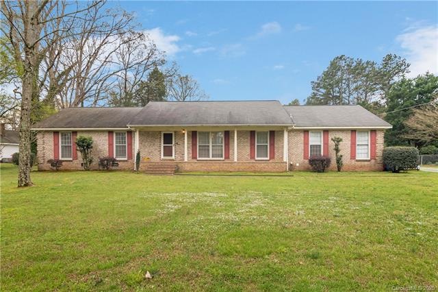 Ranch-style home, large front and back yards.