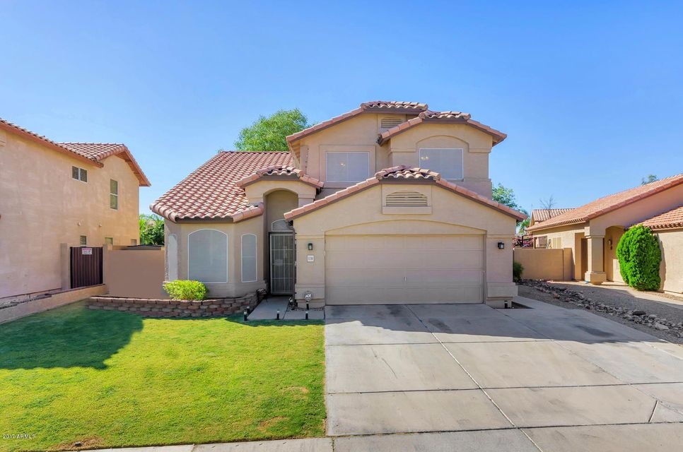 5741 W Comet Ave-large-001-29-Front Exte