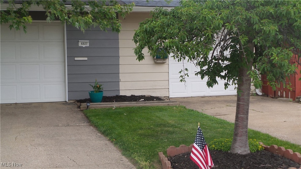 Tree lined area between front of the half duplex.