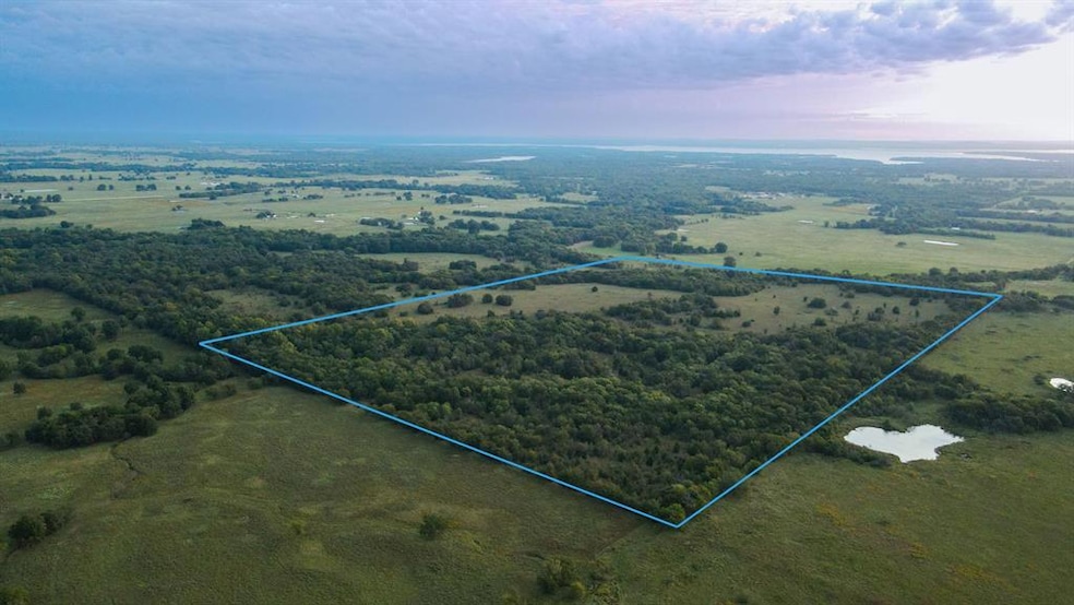 Aerial view of property's location featuring property boundaries highlighted