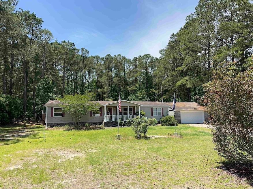 Manufactured / mobile home featuring covered porch