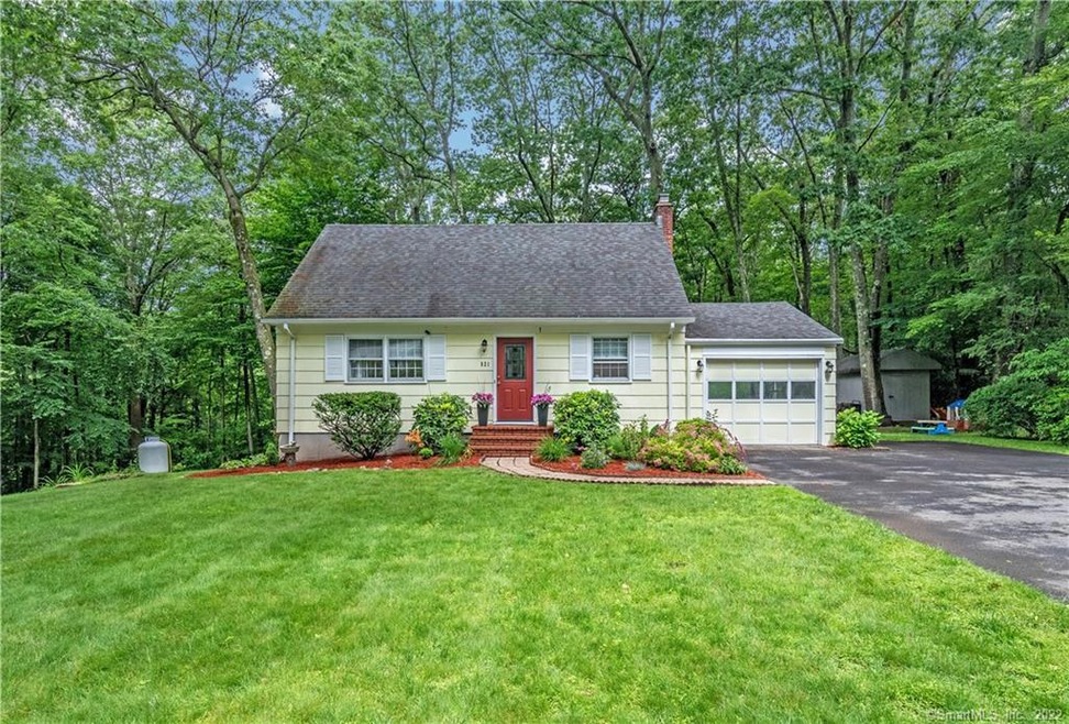 Charming Cape Cod situated on 3.6 acres with very 
