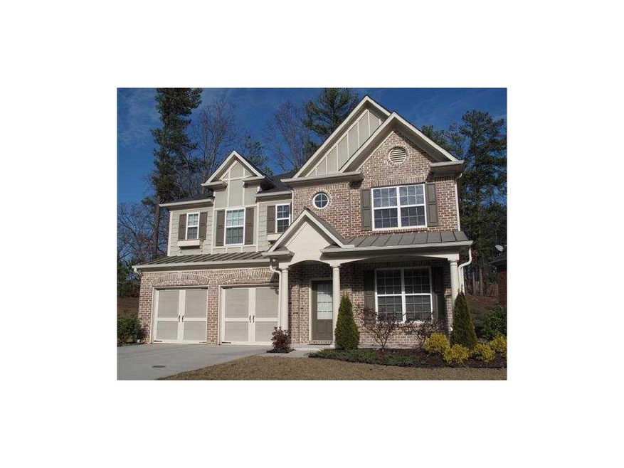 Exterior Front. Great curb appeal! Three-side bric