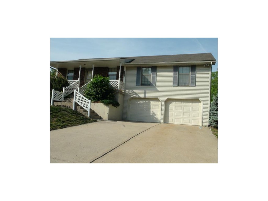 Raised ranch with maintenance free siding.