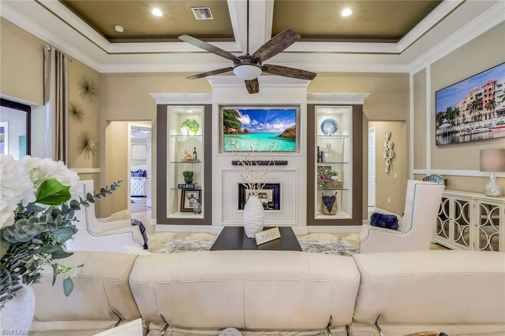 Large tiled great room featuring 14' coffered orna