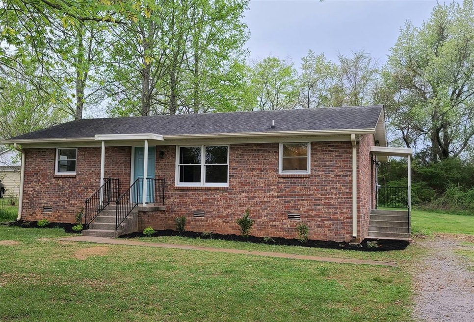 Welcome to 3461 Emery Ct - An 1134 sf redone brick ranch home in the county. Mature trees and large lot