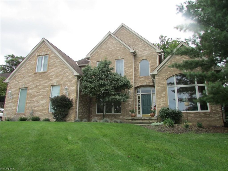 1st Floor Master on Privated Wooded Lot w/Security System & Irrigation System