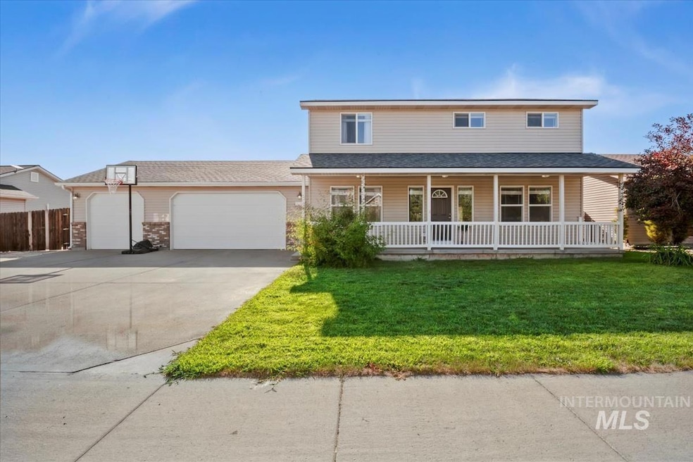 View of front facade featuring an attached garage, a porch, concrete driveway, a front yard, and a shingled roof