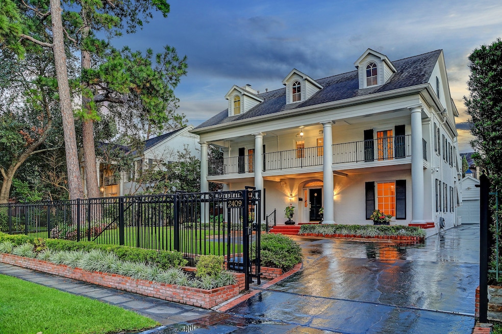 This is a classic Southern Colonial, right down to the Doric columns and gracious veranda.