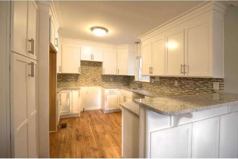 Exterior Front. Renovated kitchen with granite and