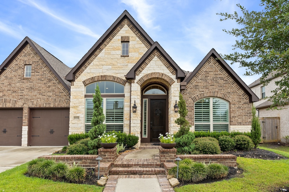 Stunning 1-story home with brick & stone elevation