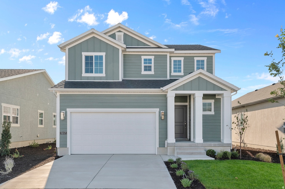 View of front of home with board and batten siding, concrete driveway, a garage, and roof with shingles