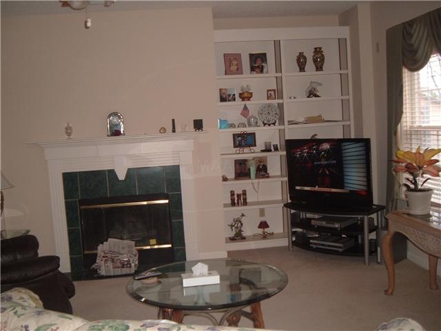 The Great Room is accented by built-in bookshelves