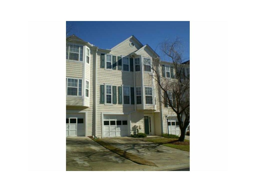 Exterior Front. 3 level townhome with garage and p