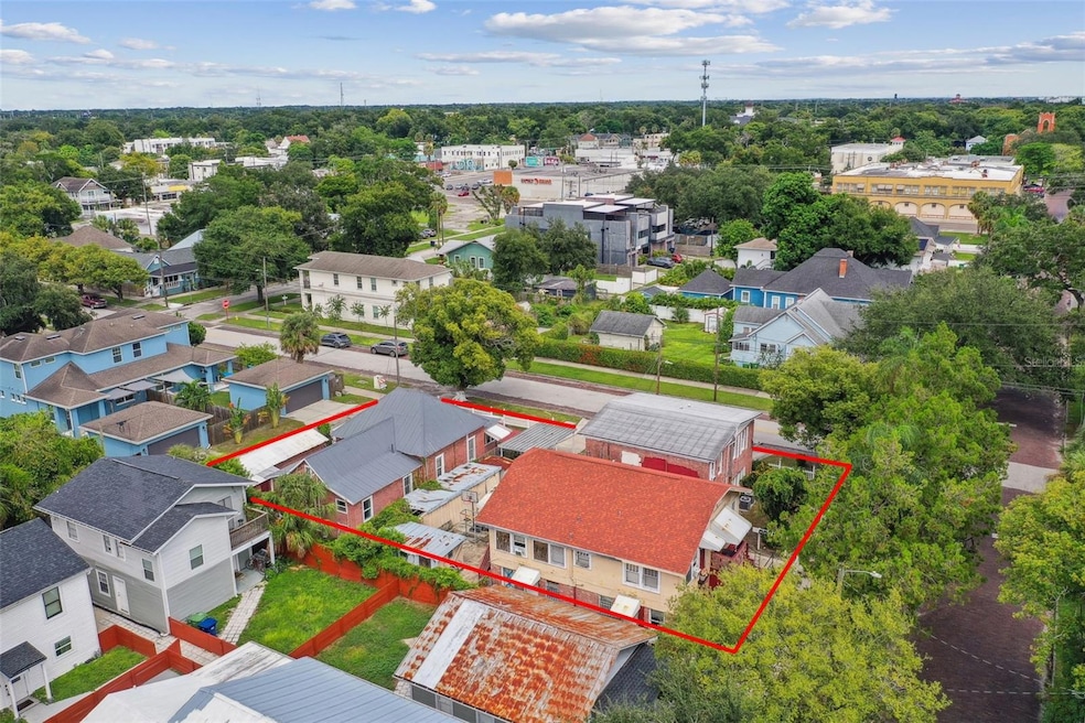 2 single family homes + 1 apartment building with 6 units + garage/storage building