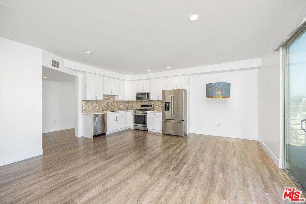 Living Room with Kitchen Overv