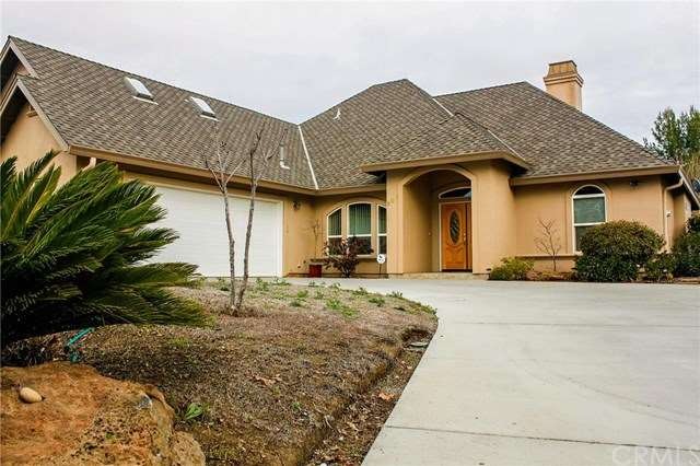 Street view.  Over-sized driveway and over-sized 2