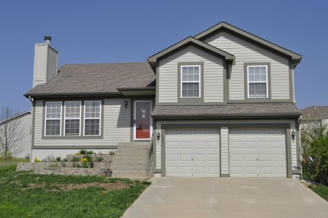 Lovely front to back split home in Olathe.
