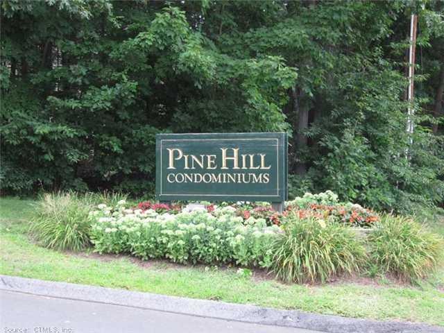 View. The entrance to Pine Hill Condominiums