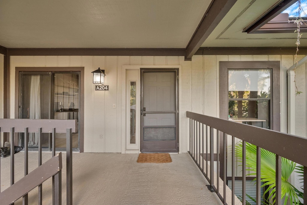 13224 Polo Club Rd unit A204, Wellington, FL 33414 - photo 1