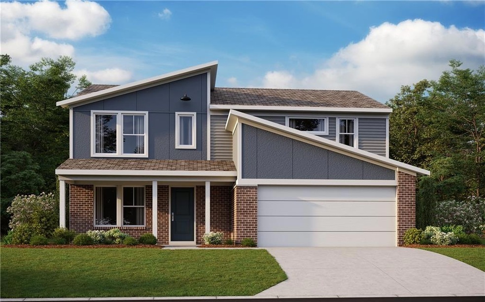View of front of house featuring a front lawn, a g
