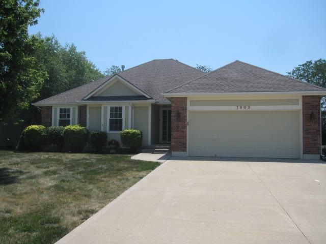 Front View of the home.  This home backs to the tr