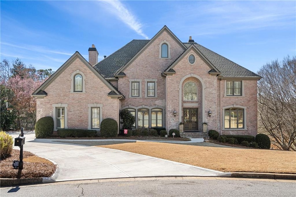 View of front of house featuring brick siding, con