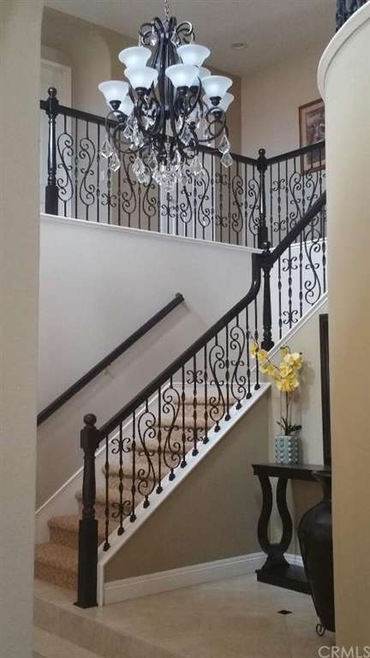 Beautiful dramatic staircase, makes a statement wh