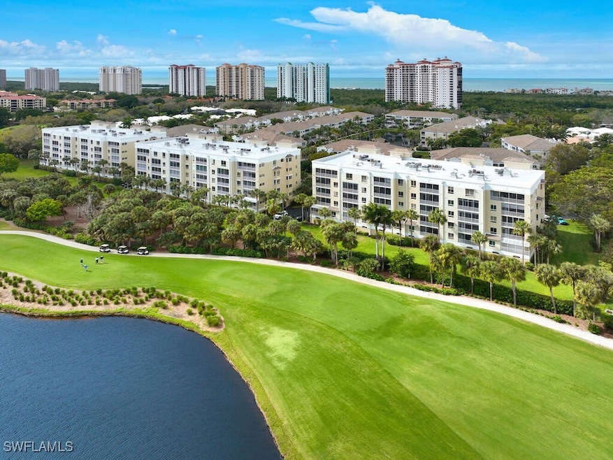 7655 Pebble Creek Cir unit 404, Naples, FL 34108 - photo 1