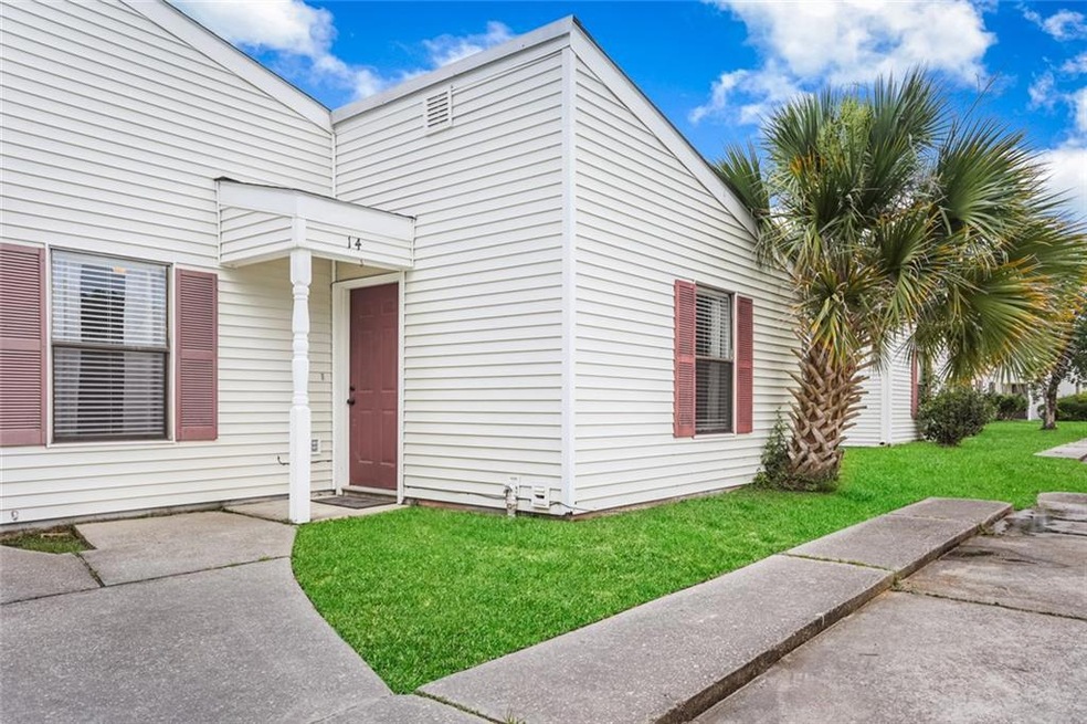 Front of the home, single story end lot with its o