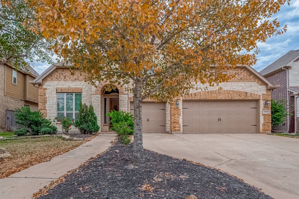 Welcome to a charming stone and brick home with a