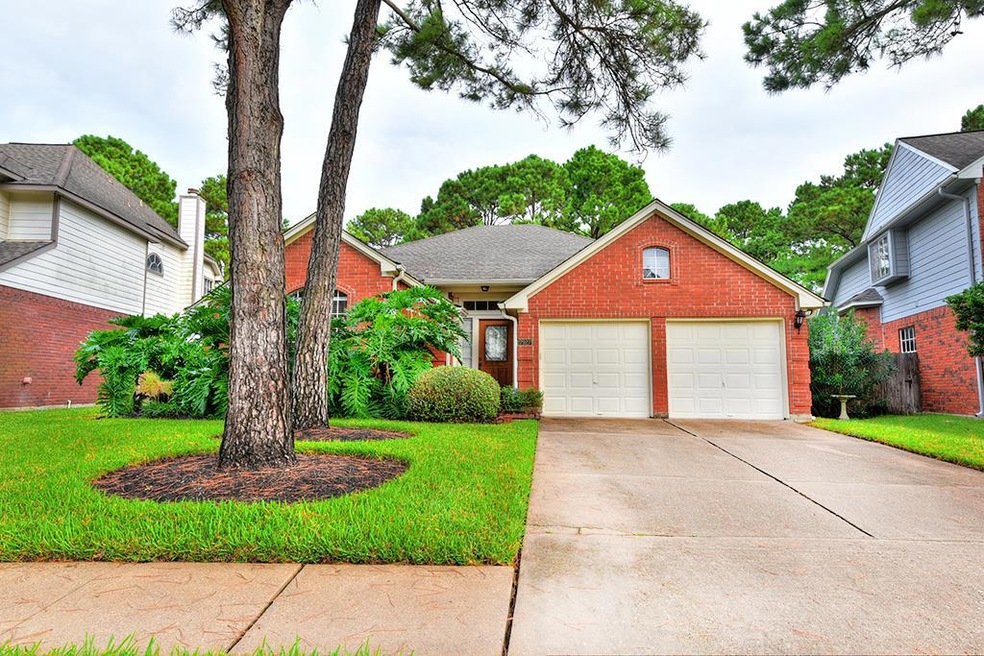 7927 Hidden Oaks Ln, Houston, TX 77095 - photo 1