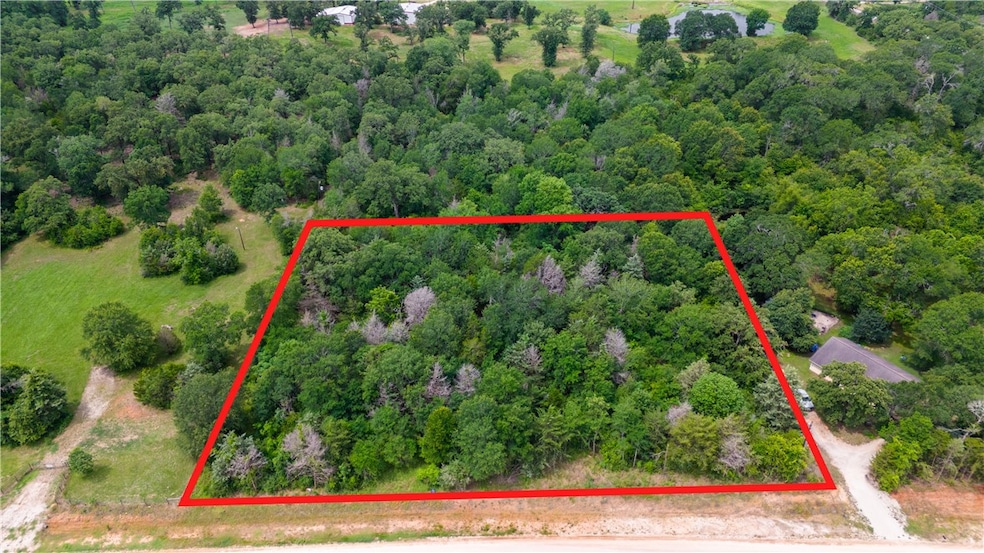 Aerial overview of property's location with a heav