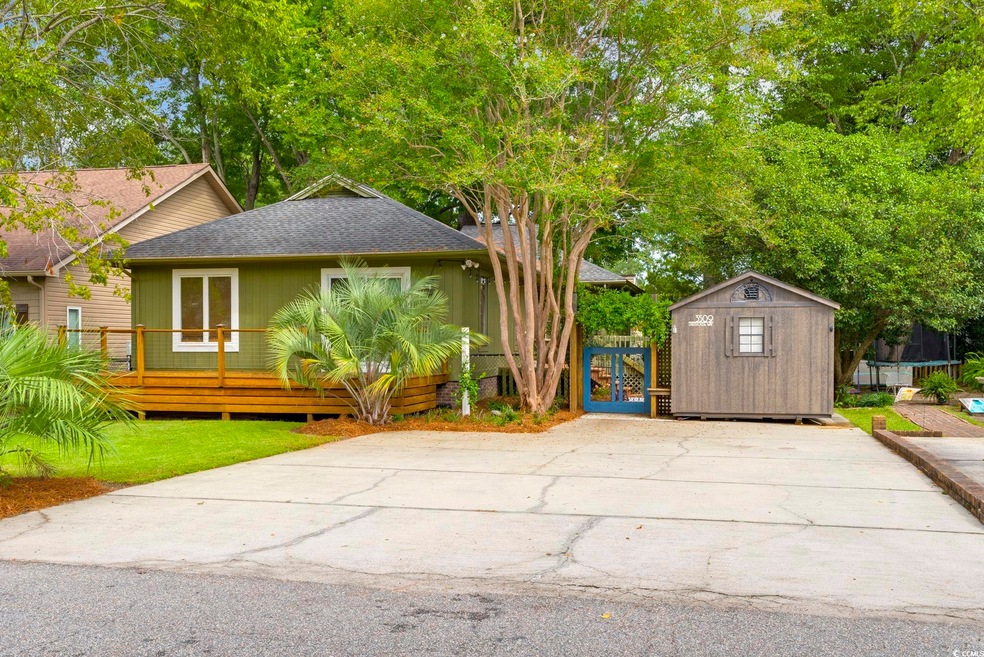 View of home's exterior featuring a storage shed