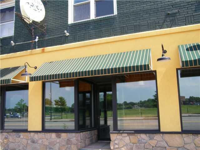 Exterior Front. Apartment is on the second level.