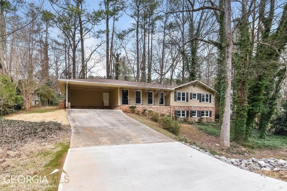 694 Hickory Ridge Rd SW, Lilburn, GA 30047 - photo 1